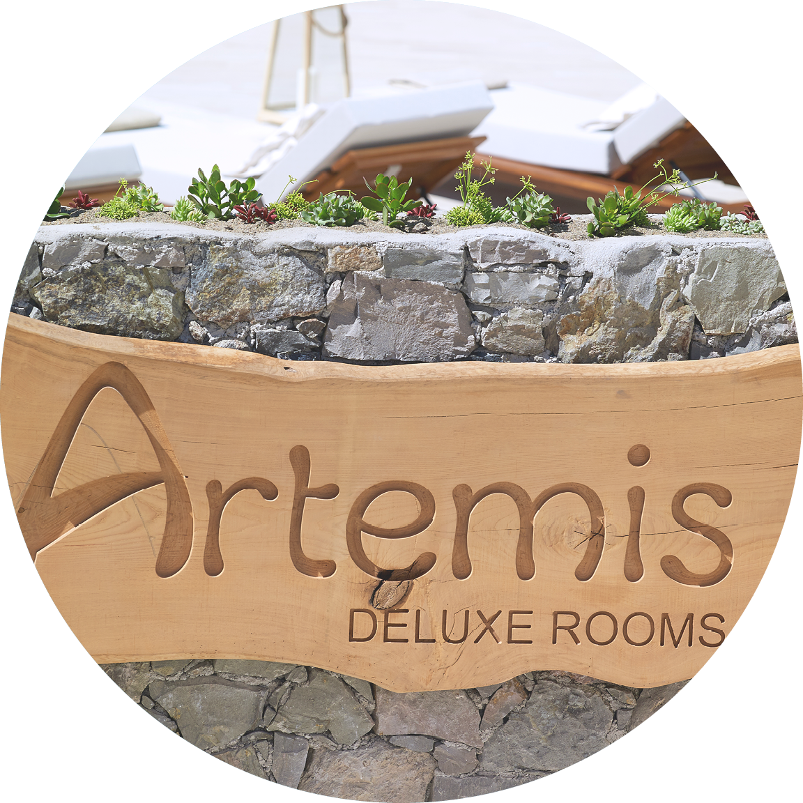 Artemis_logo_wood_decoration_Artemis_Deluxe_Rooms_Milos_island_Greece_Cyclades